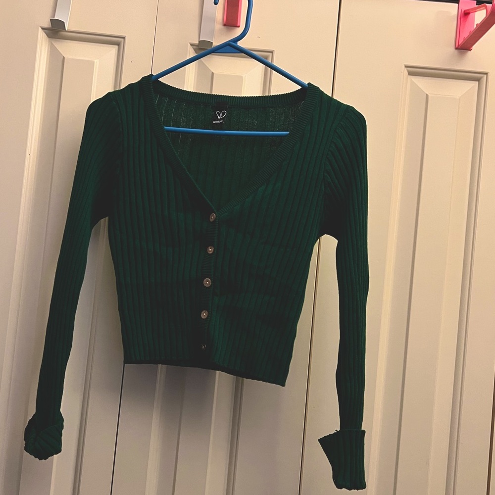 Green v-neck sweater with buttons